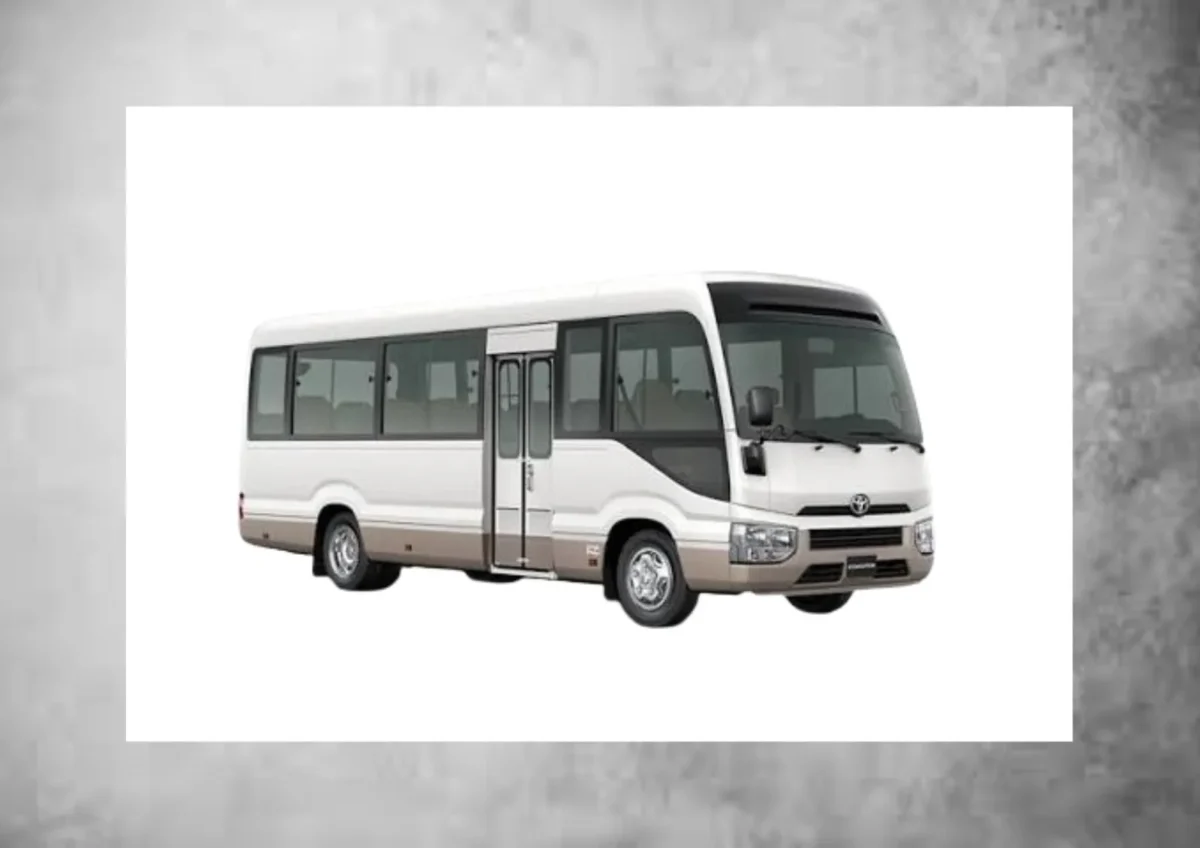 Toyota Coaster 1 Toyota Coaster luxury mini bus with spacious seating and comfortable passenger transportation design