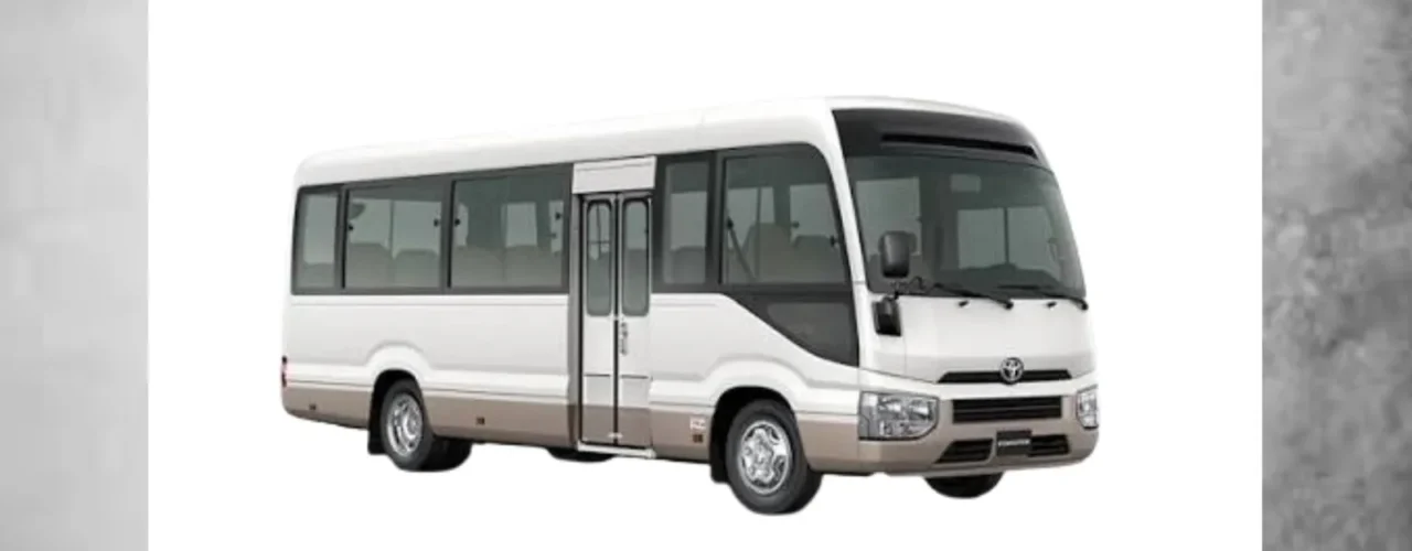 Toyota Coaster luxury mini bus with spacious seating and comfortable passenger transportation design